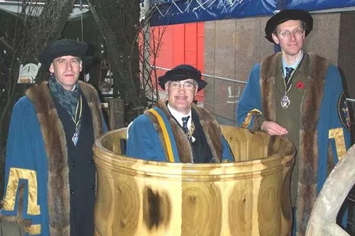 The Master sat in a 4ft 6in high, 90 gallon wassail bowl, designed by Stuart King and turned in poplar on a Hegner lathe by Stephen Cooper.