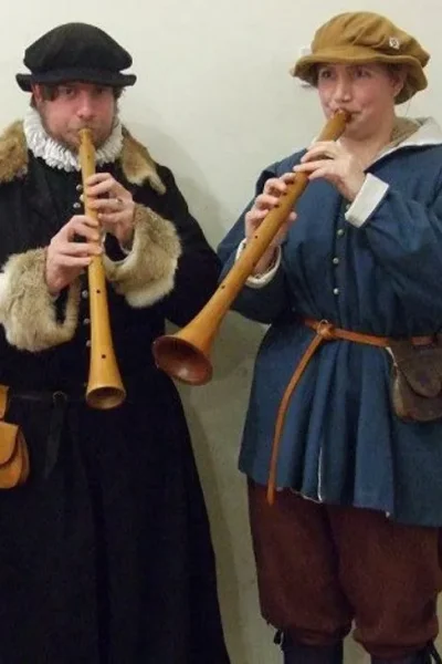 Ancient and modern Shawm players. Ancient and modern Shawm players.